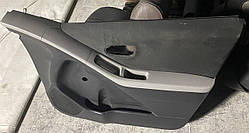 676100D460C0 Обшивка дверей передньої правої Toyota Yaris 2005-2011 б/у