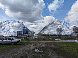 Монтаж аркового анкара. Будівництво ангарів. Полукруглі ангари.Склади