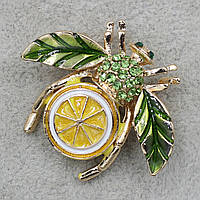Брошка металева золотиста апельсиновий жук із салатовими каменями кольорова емаль розмір виробу 40х35 мм