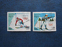 2 марки Кампучия 1988 спорт олимпиада лыжи спуск биатлон гаш