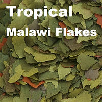 Корм для цихлід Tropical Malawi пластівці ціна за 100 грамів