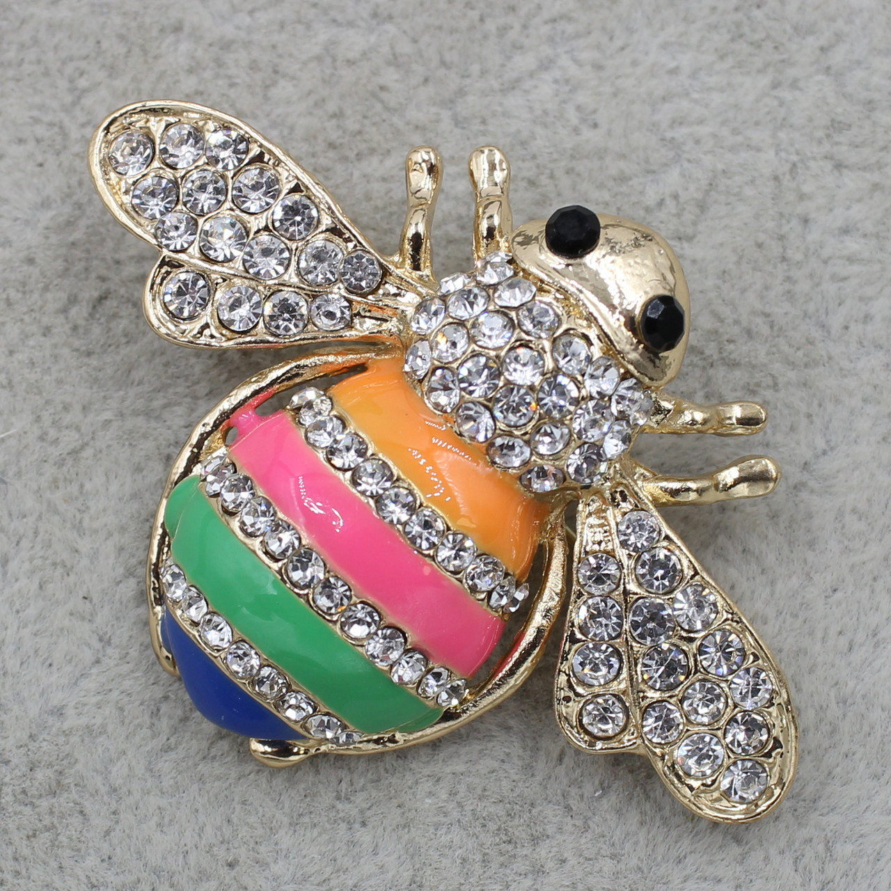 Брошка металева золотиста Шміль із різнобарвними кристалами покрита кольоровою емаллю розмір виробу 50х40 мм