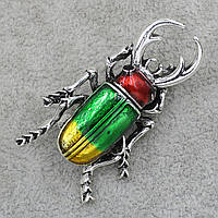 Брошка металева на сріблястій основі жук носоріг покритий кольоровою емаллю розмір виробу 40х20 мм