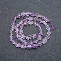 Намистини на нитці з натурального каменю Аметист галтівка d-7х6мм L-40см + - купити біжутерію оптом в інтернеті