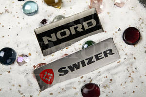 Металеві бейджи