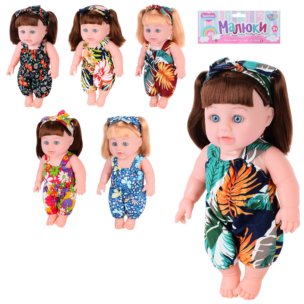 Пупс дівчинка зі світлим або темним волоссям у різнобарвному одязі музична, фото 1
