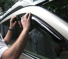 Дефлектори вікон