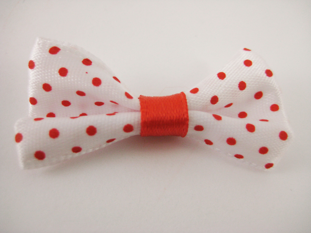 Бантики. Колір Розовий. 4х2 см