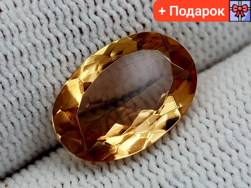 Натуральний природний топаз світло-коричневий 5.65CT. 14 x 9 x 5mm