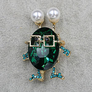 Брошка металева золотиста із сірими каменем і перлами зі стразами розмір виробу 40х30 мм