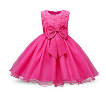 Дитяча вечірня сукня для дівчинки рожевий з бантом р. 140
