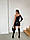 Жіноча шкіряна спідниця з розрізом на стегні в чорному кольорі, фото 2