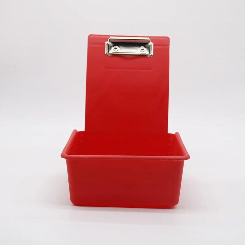 Контейнер із затискачем для стоматологів.