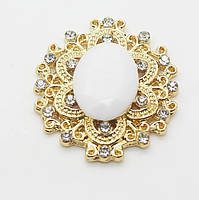 24*26 мм в золотиій оправі