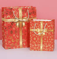 Подарункові пакети "Золотий бант на червоному" 18х23 см