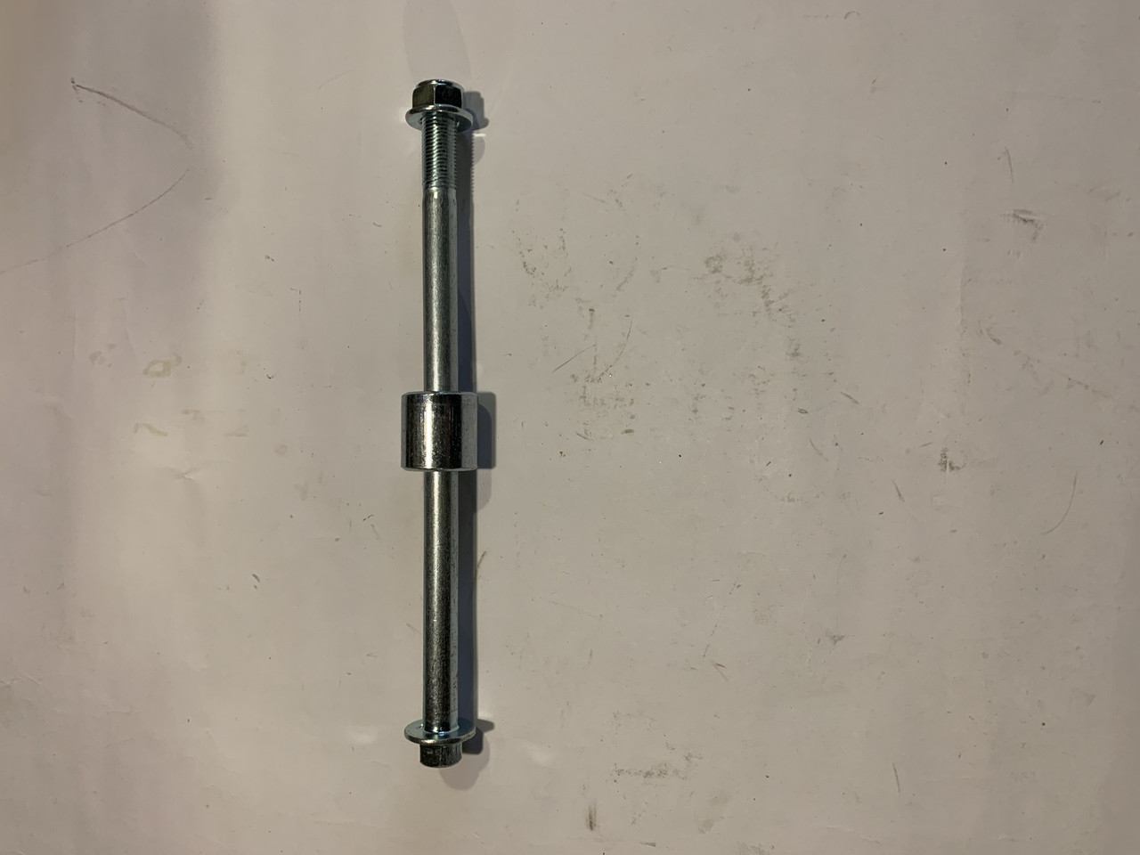 Вісь заднього колеса Альфа з втулкою