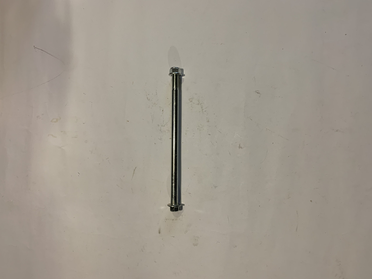 Вісь переднього колеса Актив