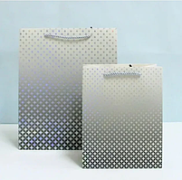 Пакет гігант вертикальний "Зірочки з голограмою на сірому" 30х42 см