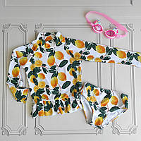 Сонцезахисний купальний костюм для дівчинки з лимонами