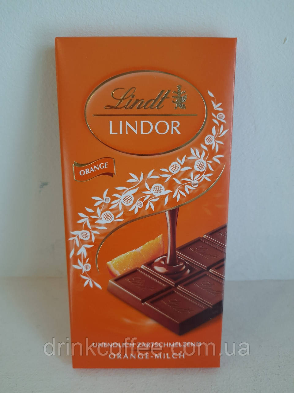 Шоколад Lindt Lindor Orange молочний з апельсиновим кремом 100g