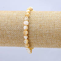 Браслет на резинці натуральний Перламутр беж. кругла галутвання d-7х5мм+- купити біжутерію дешево оптом в інтернеті