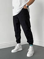 Мужские модные качественные джинсы-джоггеры чёрные (36 размер). Мужские джинсы на манжетах на липучке