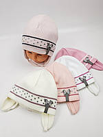 Детские демисезонные вязаные шапки с завязками на трикотажной подкладке для девочек оптом, р.48-50, Grans
