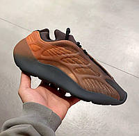 Стильные кроссы Adidas Yeezy 700. Женские кроссовки оранжевые Адидас Изи. Женские кроссы Адидас.