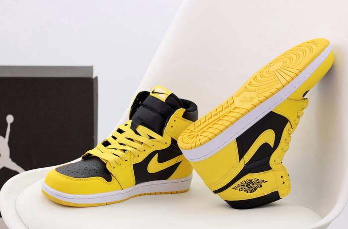 Yellow black best sale jordans