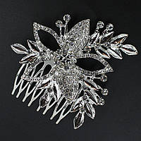 Гребінець для волосся сріблястий металевий квіточок із кришталевим камінням висота 70х70 мм