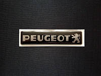 Наклейка силиконовая Peugeot черная (l=110мм, h=25мм)
