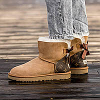 Женские УГГи с логотипом Луи Виттон НА ЗИМУ. Бежевые женские угги UGG Mini Bailey Bow x LV.