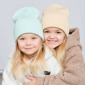 Дитячі вязані шапки оптом