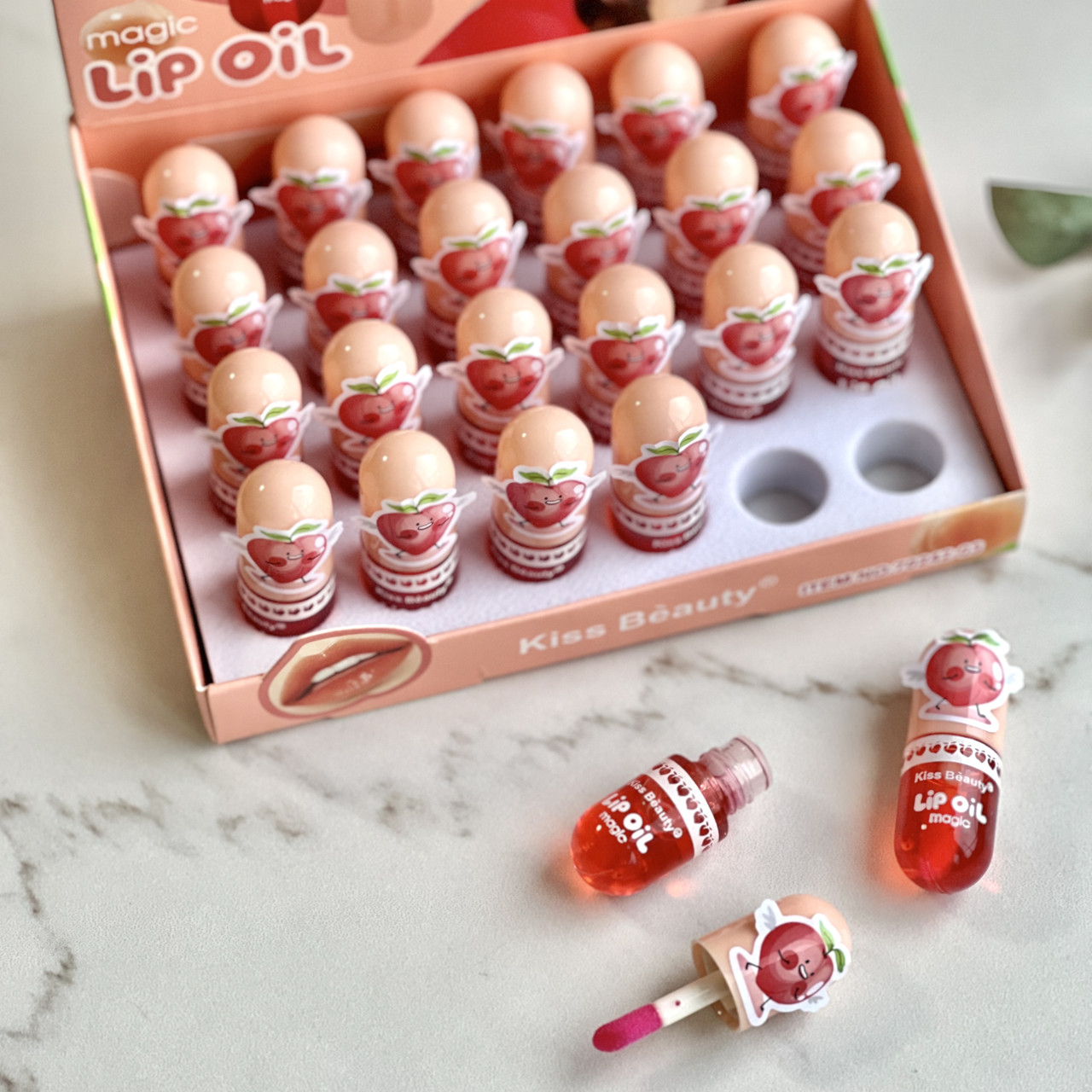 Зволожуючий Блиск для губ Kiss Beauty персик змінює колір ніжно рожевий