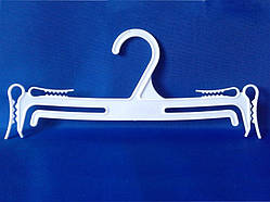 Біла пластмасова вішалка плічка 25 см із зубцями комплектів спідньої білизни та купальників