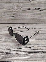 Солнцезащитные очки черные унисекс в металлической оправе