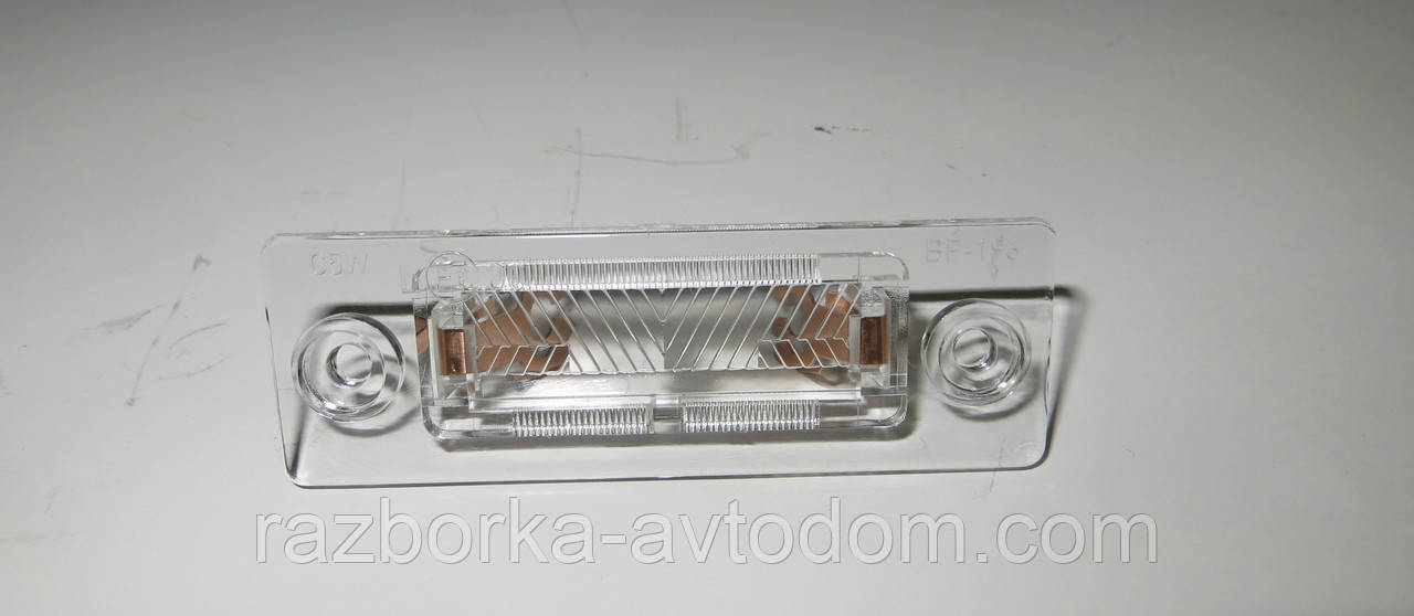 Ліхтар підсвічування номера VW CAddy 3/ T5 (03-)