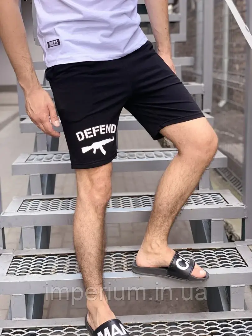 Чорні стильні трикотажні шорти з білим логотипом defend