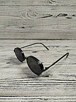 Солнцезащитные очки круглые черные унисекс в металлической оправе