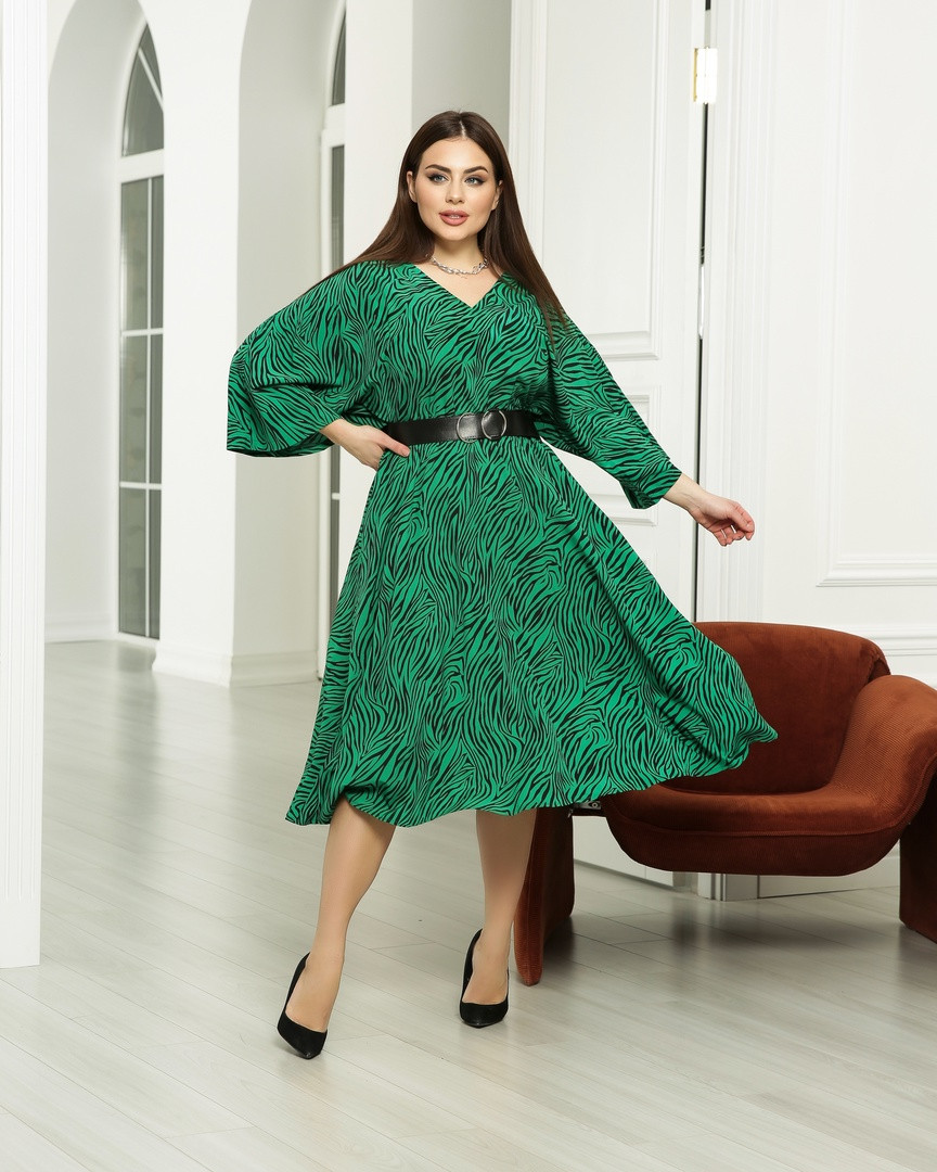 Разклешенное жіноче плаття великого розміру з v-подібним вирізом.Розміри:48/64+Кольору