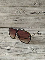 Солнцезащитные очки коричневые унисекс в пластиковой оправе