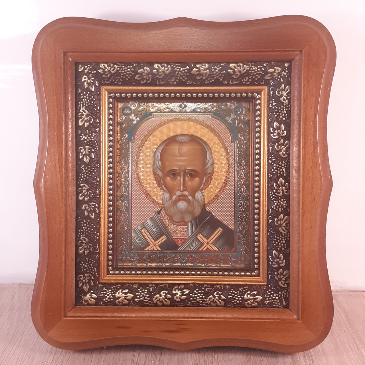 Ікона Миколи Чудотворця святителя, лик 10х12 см, у світлому дерев'яному кіоті.