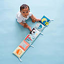 Розвиваюча книжка-розкладушка - Веселі пригоди Taf Toys 12385, фото 8
