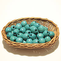 Дерев'яні намистини 20мм, дірка 7мм (50шт в упаковці) бірюзового кольору