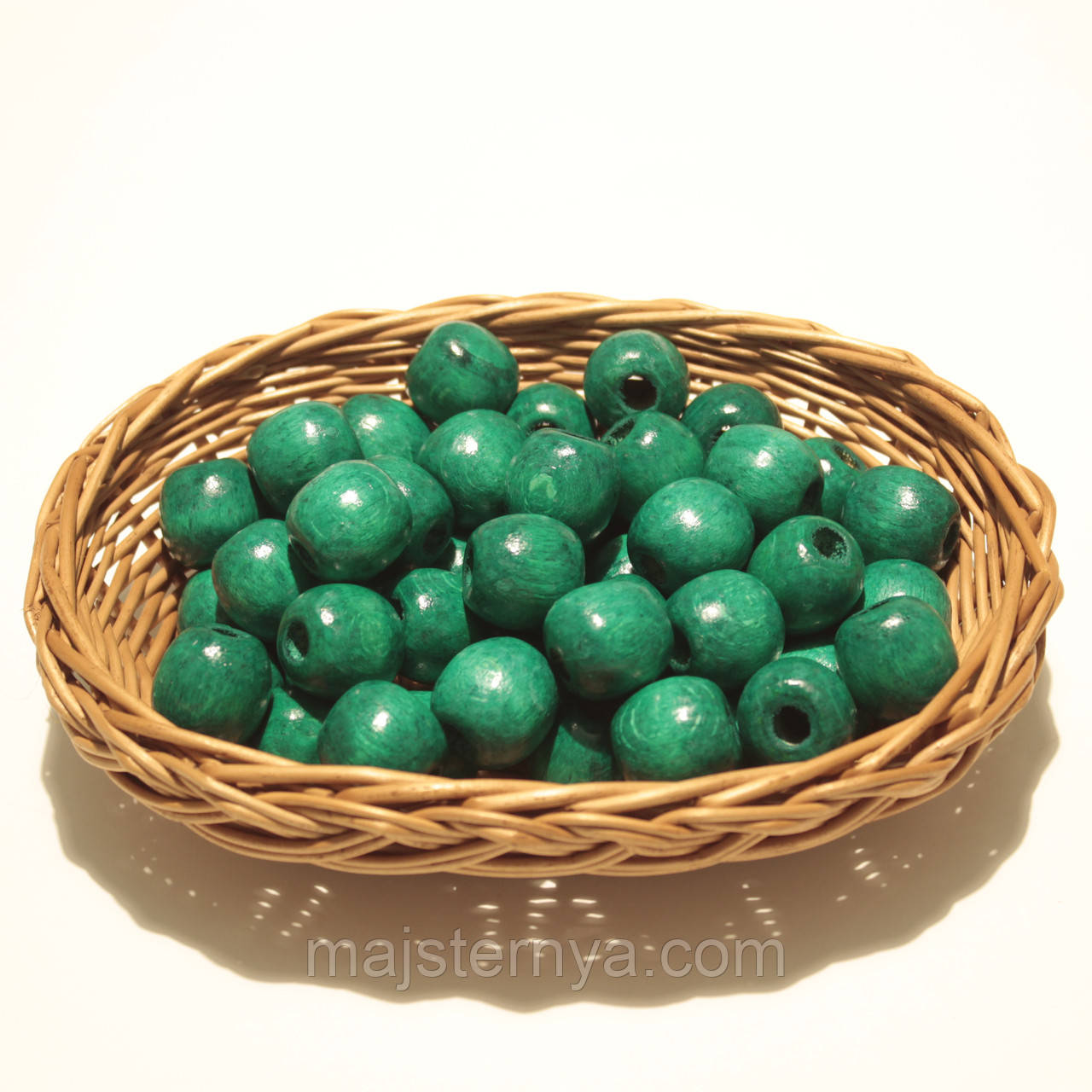 Дерев'яні намистини 20мм, дірка 7мм (50шт в упаковці) смарагдового кольору