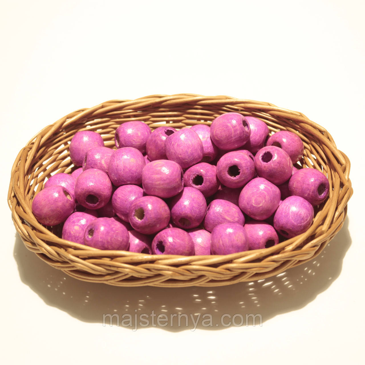 Дерев'яні намистини 20мм, дірка 7мм (50шт в упаковці) коліру фуксії