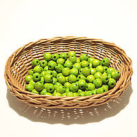 Дерев'яні намистини 12мм (100шт в упаковці) салатового кольору