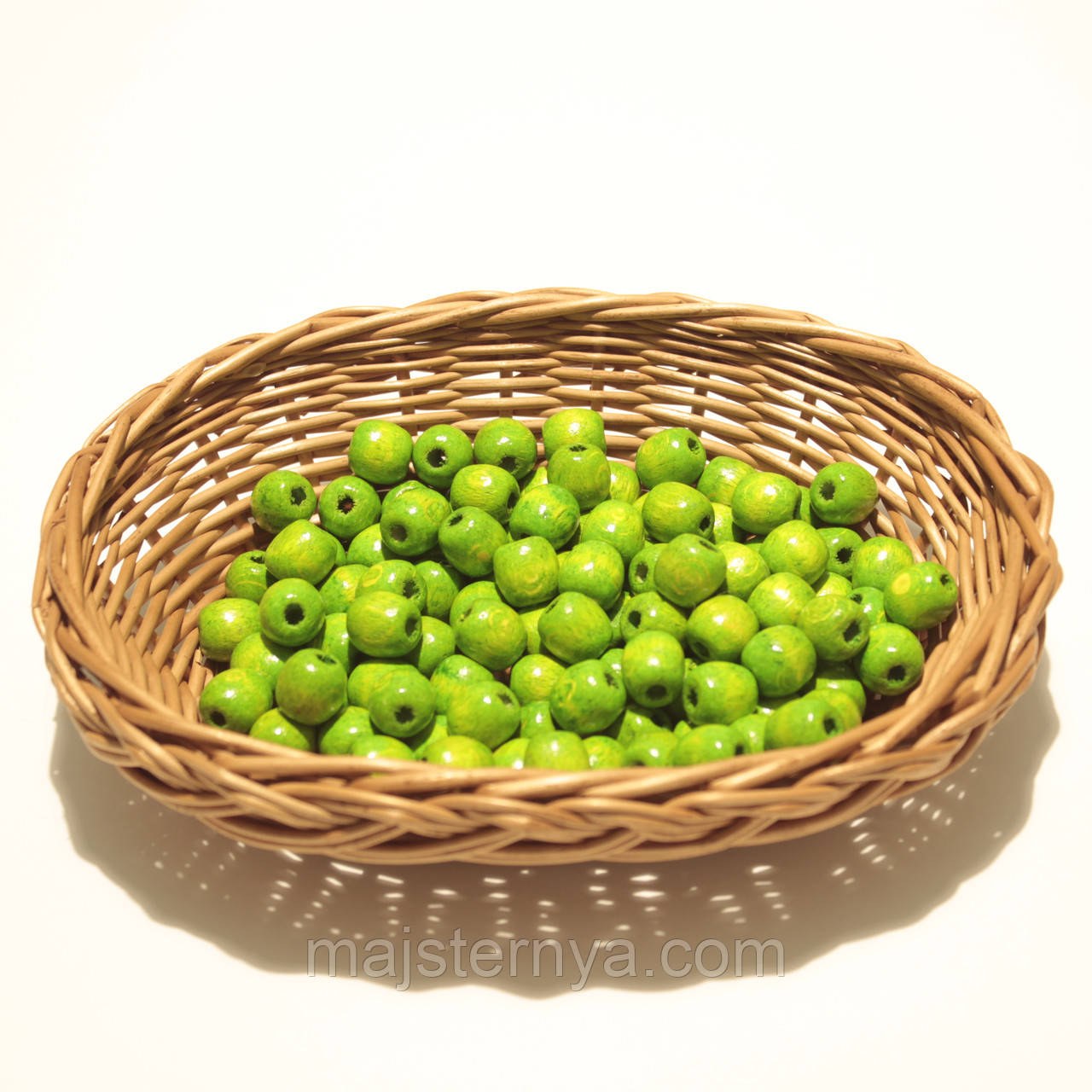 Дерев'яні намистини 12мм (100шт в упаковці) салатового кольору