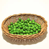 Дерев'яні намистини 12мм (100шт в упаковці) зеленого кольору