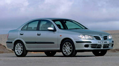 Амортизатор задній на Nissan Almera N16 від 2000 г.в./Задній амортизатор ніссан альмера н16, фото 3